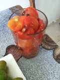 Jitomates cocidos con hierbas de olor