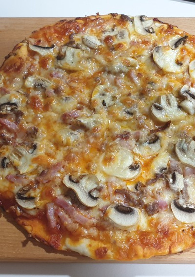 Una foto de Pizza preparada por la pequeña de la casa