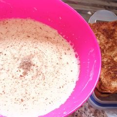 A picture of Flavoured milk and french toast 🍞.
