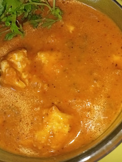 A picture of Paneer butter masala (with homemade cheese).