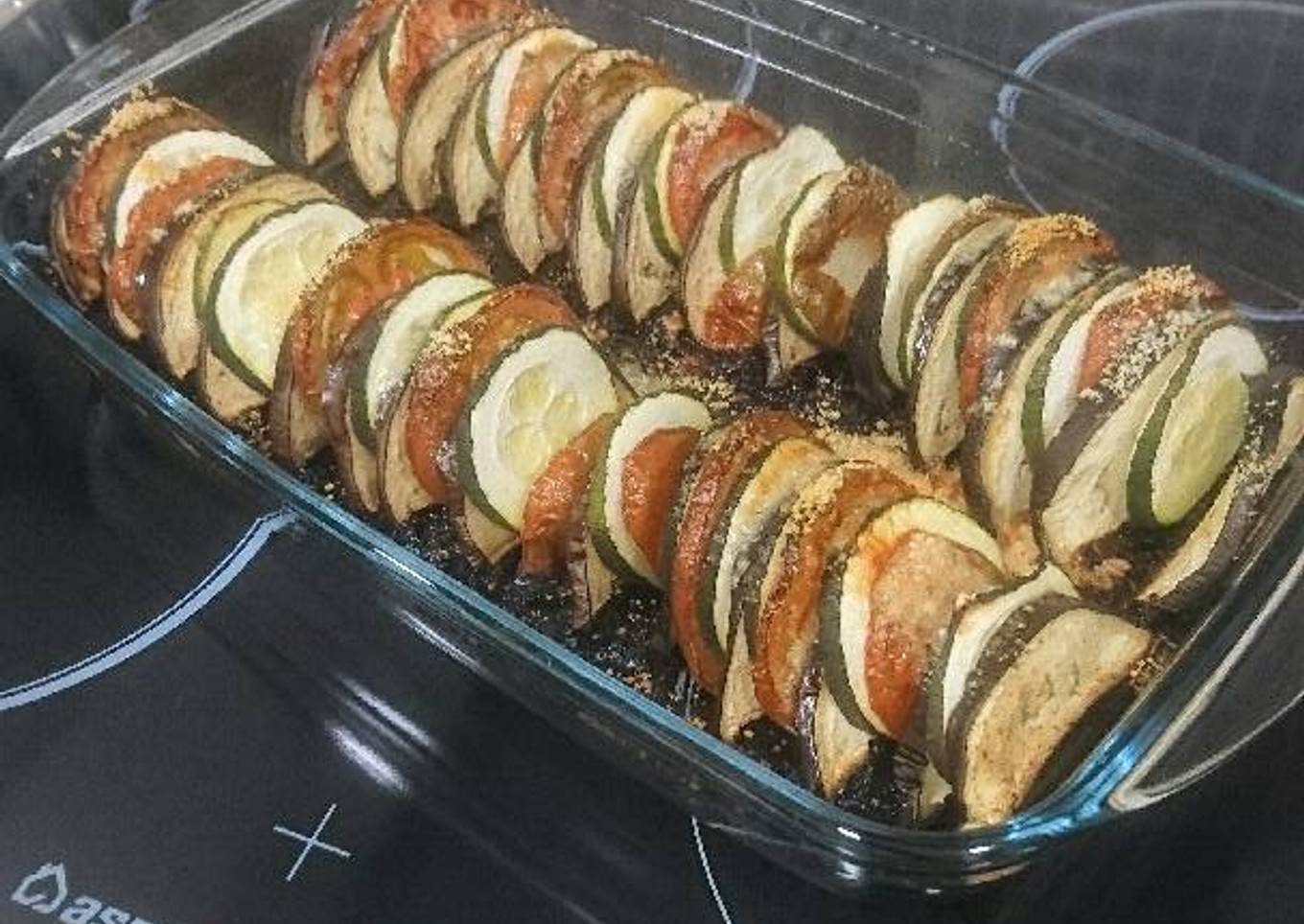 Berenjena, calabacín y tomate con parmesano al horno