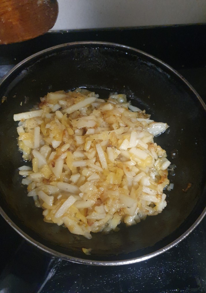 Una foto de Guarnición caramelizada de patata, manzana y cebolla