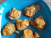 A picture of sliced baked potato
