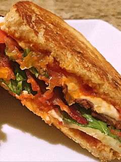 A picture of Caprese bacon melt.