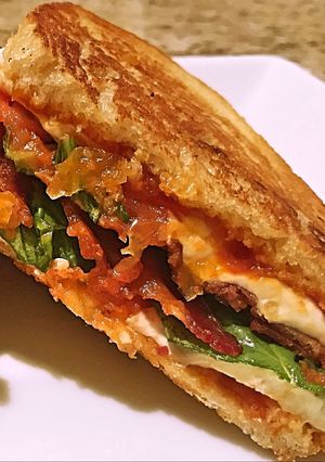 A picture of Caprese bacon melt.