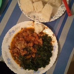 A picture of Ugali, mchicha and beef.
