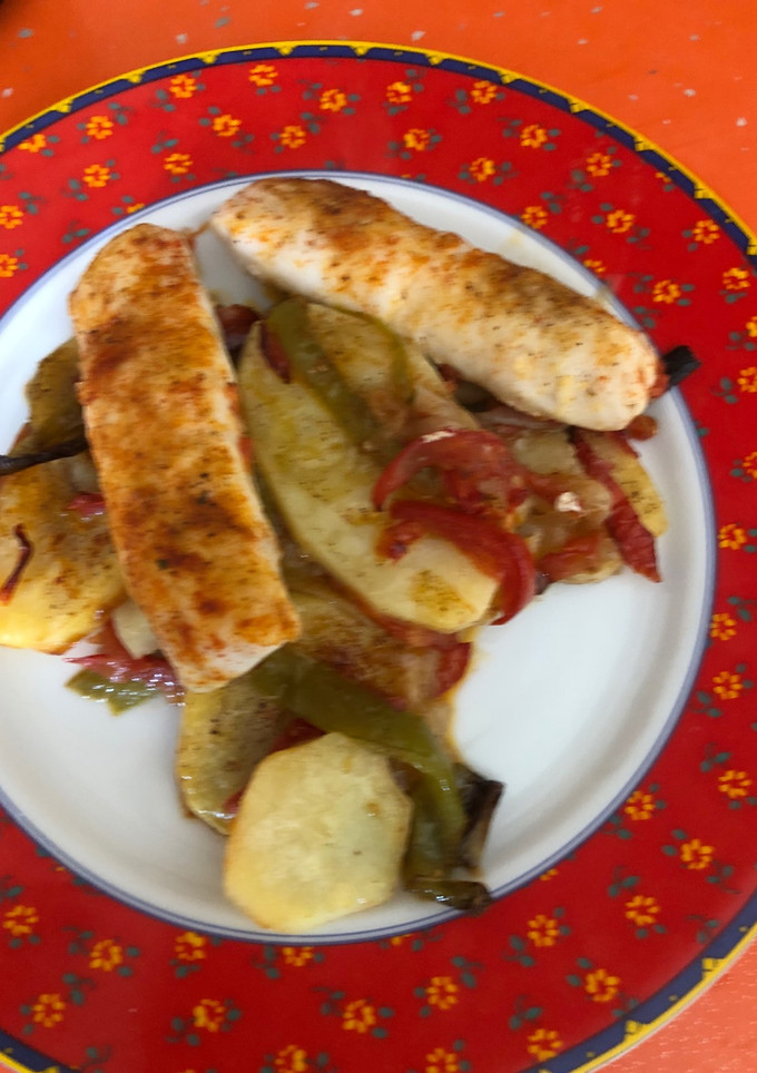 Una foto de Merluza al horno con patatas