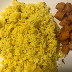 A picture of #GA4# week21 TURMERIC COCONUT Milk rice.