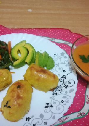A picture of Baked potato croquettes with pumkin/carrot/tomato soup.
