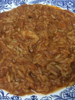 Una foto de Arroz de bacalao con tomate