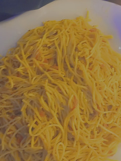 A picture of Fried spaghetti with diced pomo.