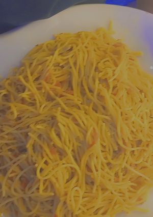 A picture of Fried spaghetti with diced pomo.