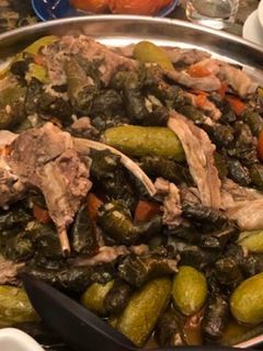 صورة لوصفة كوسا وورق عنب بالقصه