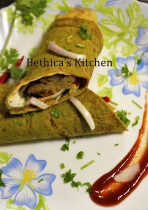 A picture of Stuffed Oats Cheela Roll.