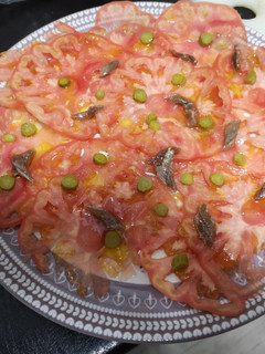 Una foto de Carpaccio de tomate