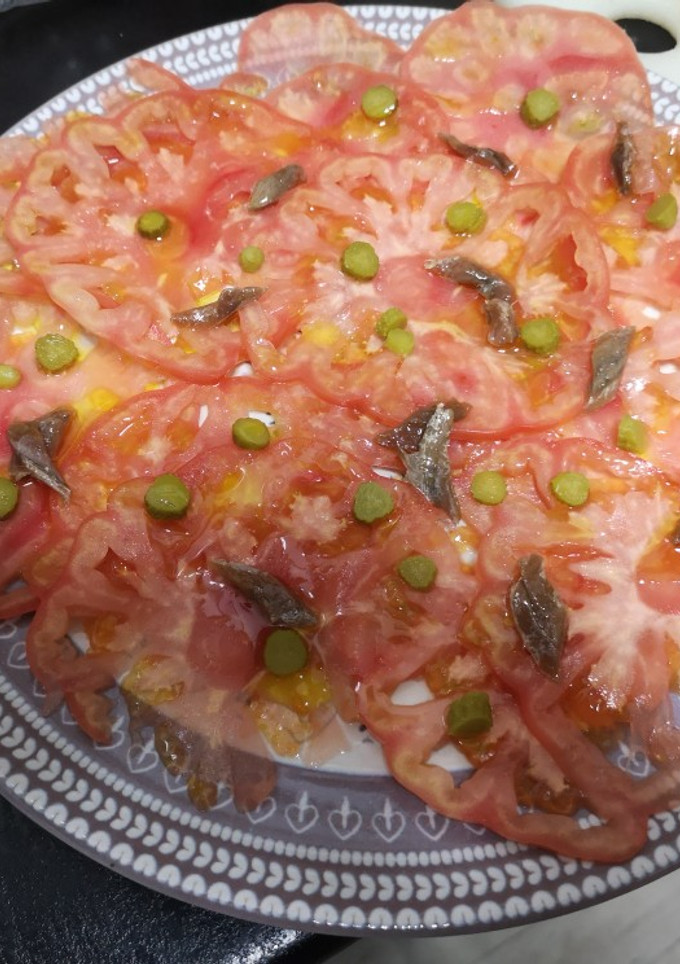 Una foto de Carpaccio de tomate