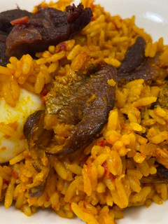 A picture of Palm oil Rice/ Native Rice.