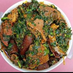 A picture of Vegetable soup with meats.