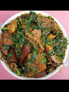 A picture of Vegetable soup with meats.