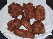 A picture of fried chicken legs