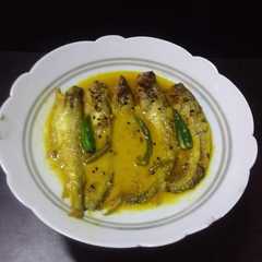 Una foto de পাবদা মাছের তেলঝাল (Pabda Macher tel jhal recipe in Bengali)