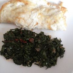 A picture of Omelet with fried kale.