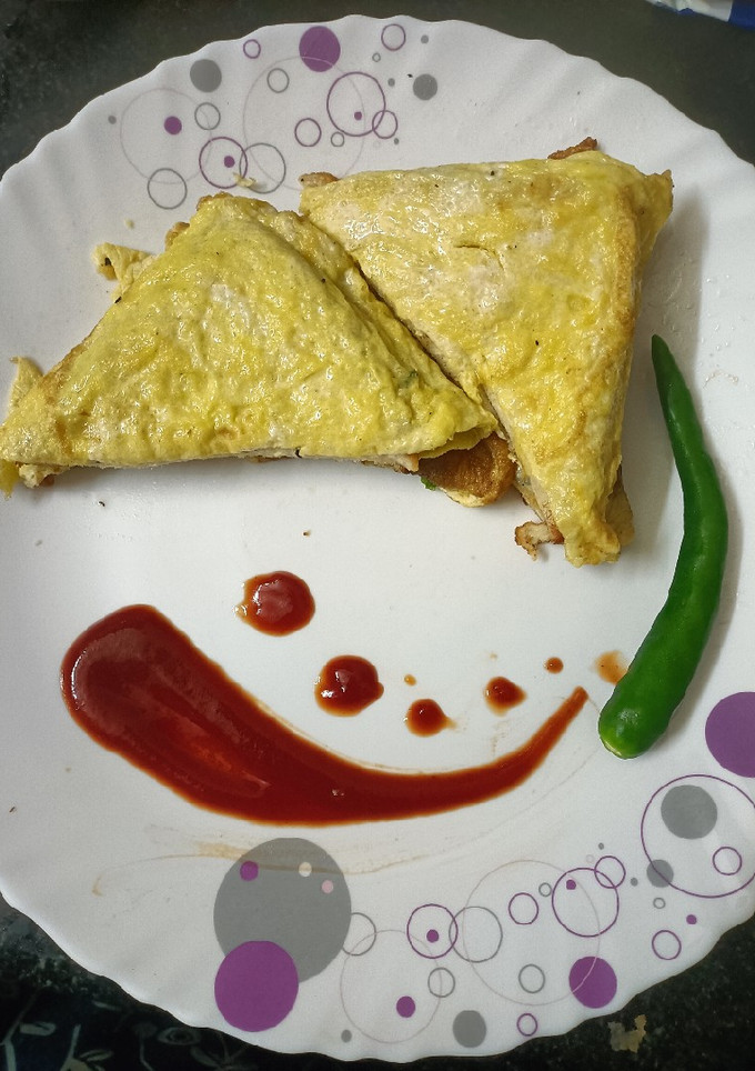 ஸ்ட்ரீட் சைடு பிரட் ஆம்லெட்(street side bread omelette recipe in tamil) செய்முறை முக்கிய புகைப்படம்