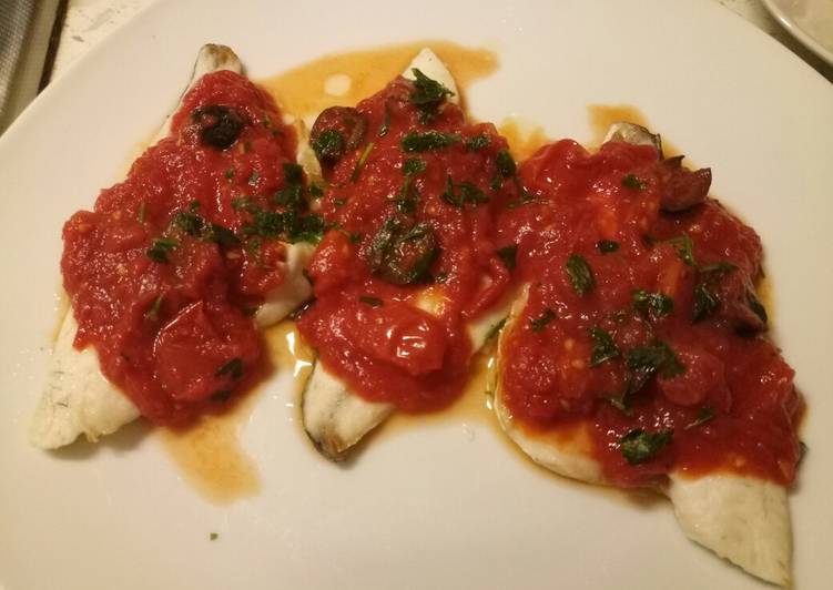 Recipe of Homemade Sea bass with tomato and olive sauce