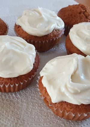 A picture of Vanilla Cupcakes with Cream Cheese frosting.