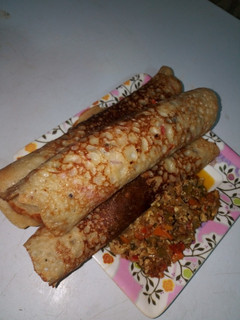 A picture of Chicken Pancake with Corned Beef Sauce.