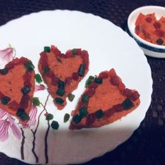 A picture of Heart shape spicy upma.