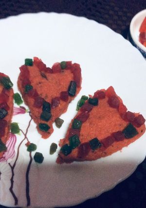 A picture of Heart shape spicy upma.