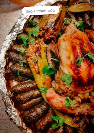 A picture of Stuffed Grape Leaves with Country-Style Rooster.