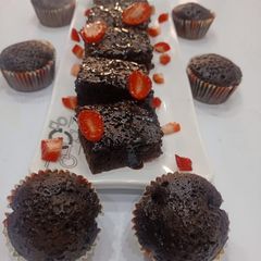 A picture of Brownies with Brownies cup cake.