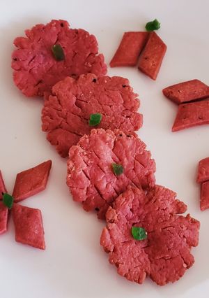 A picture of Beetroot farsi puri and shakkarpara.