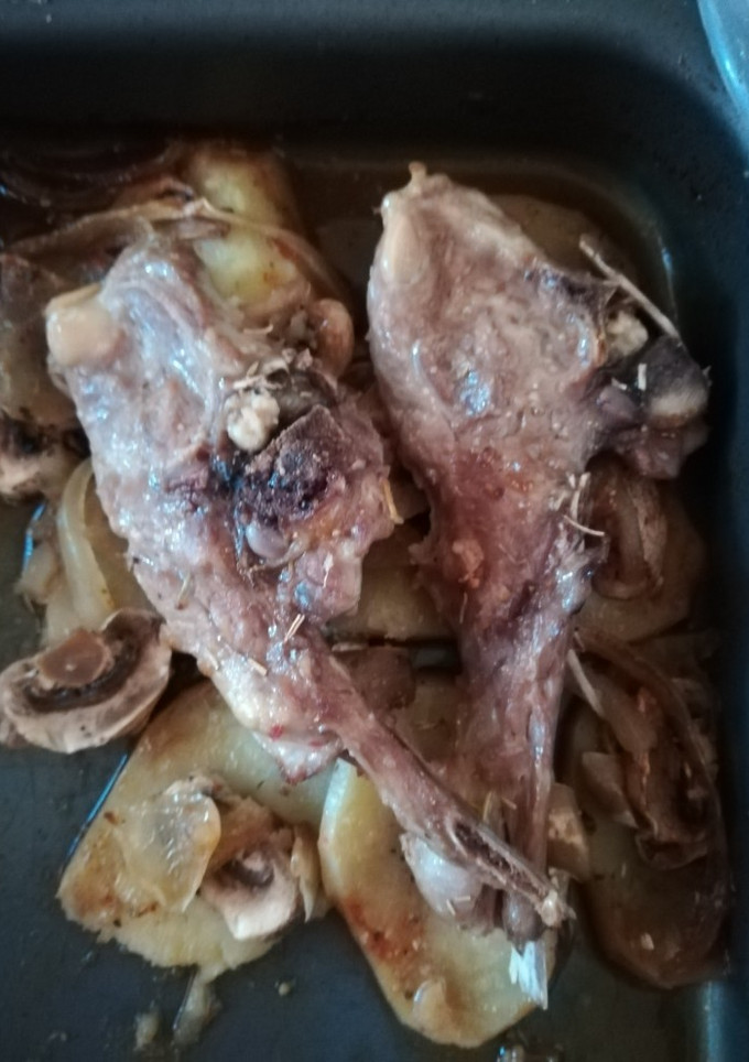 Una foto de Chuletillas al horno con champiñones