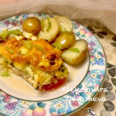 A picture of Juicy chicken breast with zucchini.