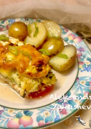 A picture of Juicy chicken breast with zucchini.