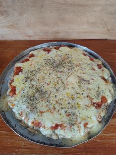 Una foto de Pizza de pollo sin harina