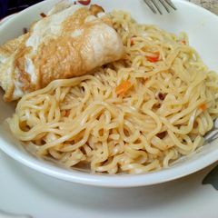 A picture of Indomie with fried egg.