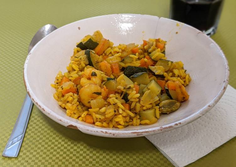 Arroz con gambas y calabacín al curry de cerveza