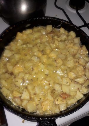Una foto de Tortilla de papas con cheddar