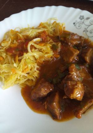 A picture of Smoked beef stew with buttered cabbage.