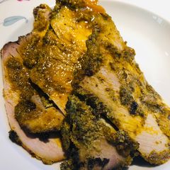 A picture of Roasted Pernil (Roasted Pork Shoulder).