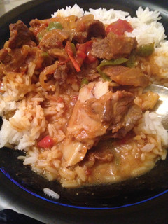 A picture of Beef stewed with rice.