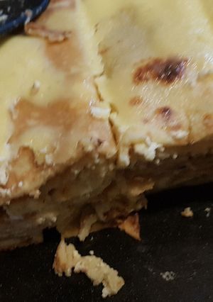 O poză a rețetei Clătite gratinate cu brânză.