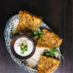 A picture of Veggies stuffed aloo paratha.