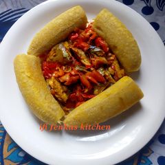 Boiled half ripe plantian and fish suace A picture of Boiled half ripe plantian and fish suace.