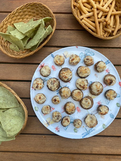 Una foto de Champiñones rellenos de queso crema y tocino