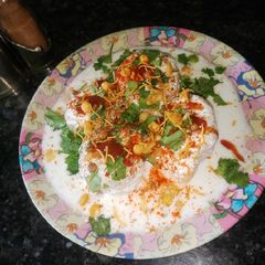 A picture of Dahi Wada(urad daal ke wade).